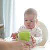 imageDr Browns Milestones Cheers 360 Spoutless Transition Cup Travel Friendly and Leak Free Sippy for Babies and Toddlers Green and Pink BPAFree 10 oz300 mL 9mGreen with Handles