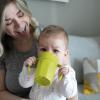 imageDr Browns Milestones Cheers 360 Spoutless Transition Cup Travel Friendly and Leak Free Sippy for Babies and Toddlers Green and Pink BPAFree 10 oz300 mL 9mGreen with Handles