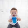 imageDr Browns Milestones Cheers 360 Spoutless Transition Cup with Handles Travel Friendly and Leak Free Sippy for Babies and Toddlers Blue and Pink BPAFree 7 oz200 mL 6mBlue and Pink with Handles
